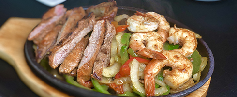 Ultimo Fajita Skillet at Guadalajara Grill, Bar, & Table Side Salsa in Tucson Arizona. Ultimo Fajita Skillet at Guadalajara Grill, Bar, & Table Side Salsa in Tucson Arizona.